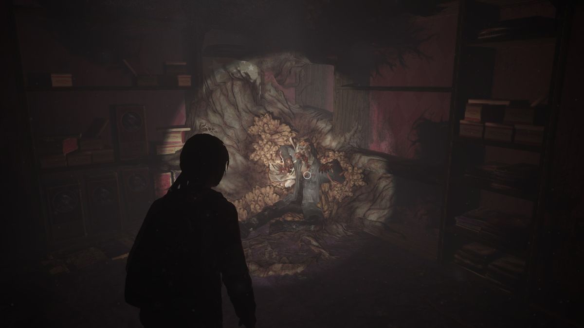 The Last of Us: Left Behind (PlayStation 4) screenshot: Pharmacist found, now let's check his pockets.