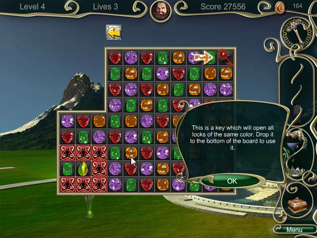 Jewel Match 3 (Browser) screenshot: Get the key to the bottom of the board to unlock the locked area on the lower left.