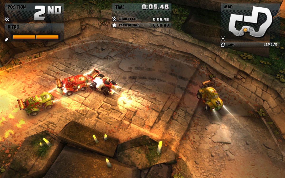 Mini Motor Racing (Windows) screenshot: A race at night on the ruins track