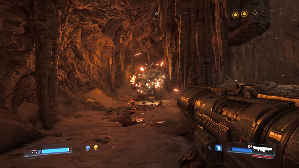 Doom (PlayStation 4) screenshot: Firing a rocket launcher at the enemy
