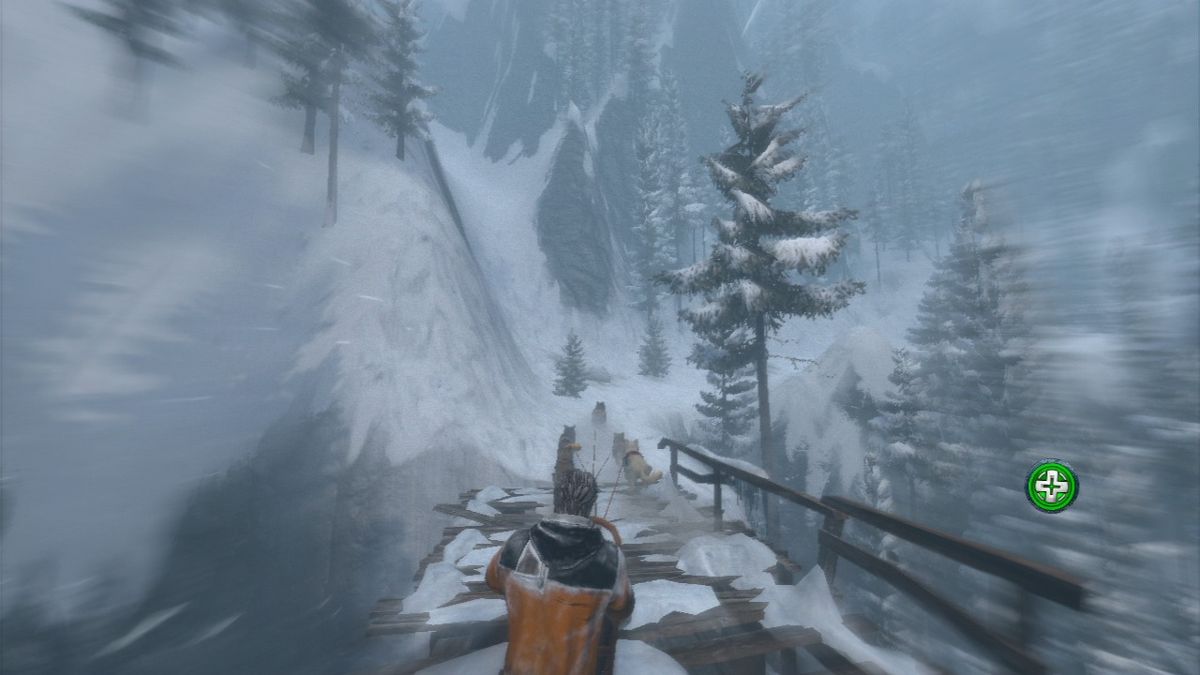 Cabela's Survival: Shadows of Katmai (PlayStation 3) screenshot: Crossing the bridge in a sled.