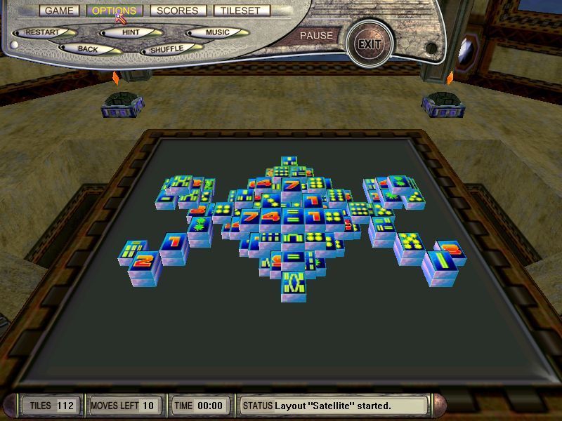 3D Mahjong (Windows) screenshot: This is what a 3D table looks like. The tile set is hard to read though. At the top of the screen is the full menu bar, this generally recedes so that the top four buttons are hidden