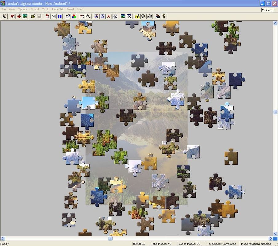 Over 1000 Jigsaw Puzzles (Windows) screenshot: The start of a puzzle. This puzzle is using the optional ghost image as an aid. In the lower right is a message showing that piece rotation is currently disabled