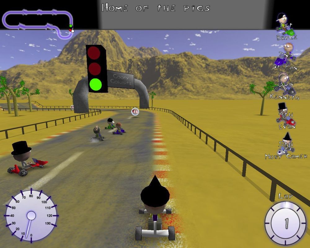 Goofy Gokarts (Windows) screenshot: The start of a race This course has lots of 'Pig Bomb' power ups