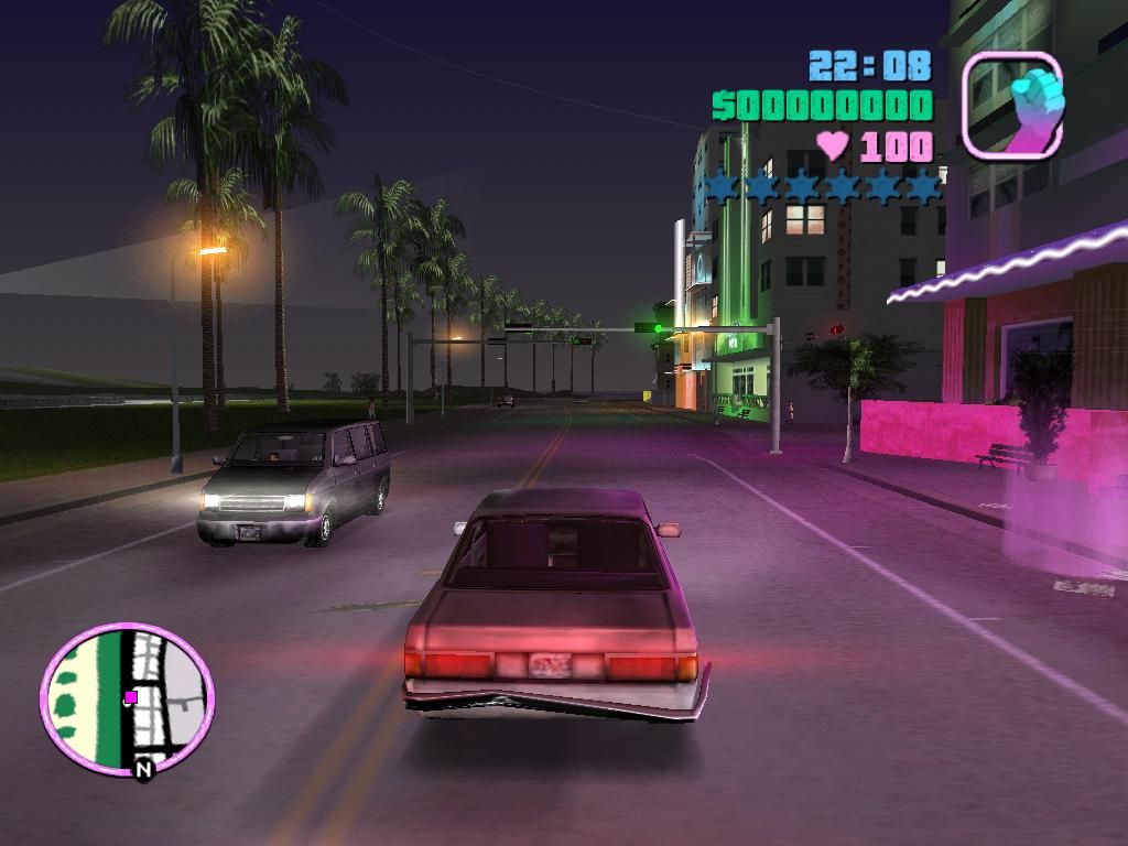 Grand Theft Auto: Vice City (Windows) screenshot: Cruising along the strip at night.