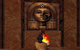 Powerslave (DOS) screenshot: Broken beauty in front of me. Kinda similar to that painting in Blood, with a nun holding a baby, and the nun slowly faded into a skeleton.