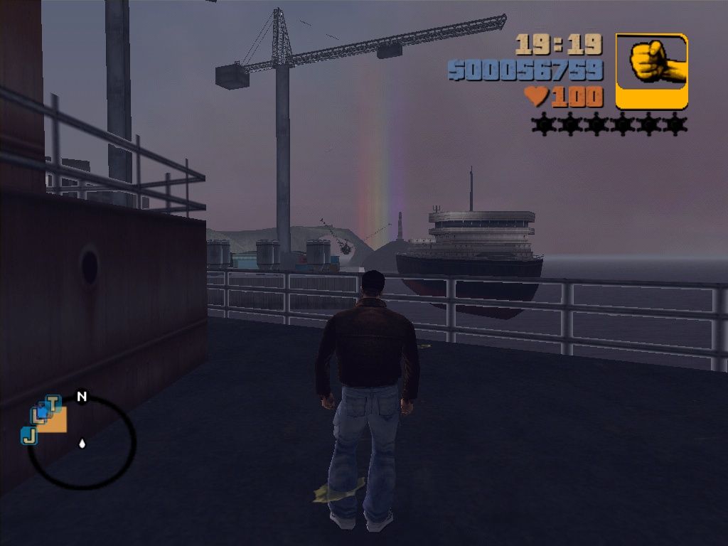 Grand Theft Auto III (Windows) screenshot: The weather simulation is really great. They even managed to display realistic rainbows when the rain begins to stop. This shot was made on a ship in the harbor after long, hard rain.