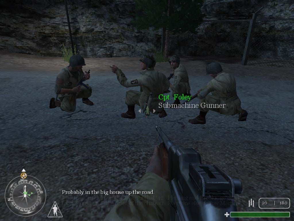 Call of Duty (Windows) screenshot: Crouched soldiers form a plan