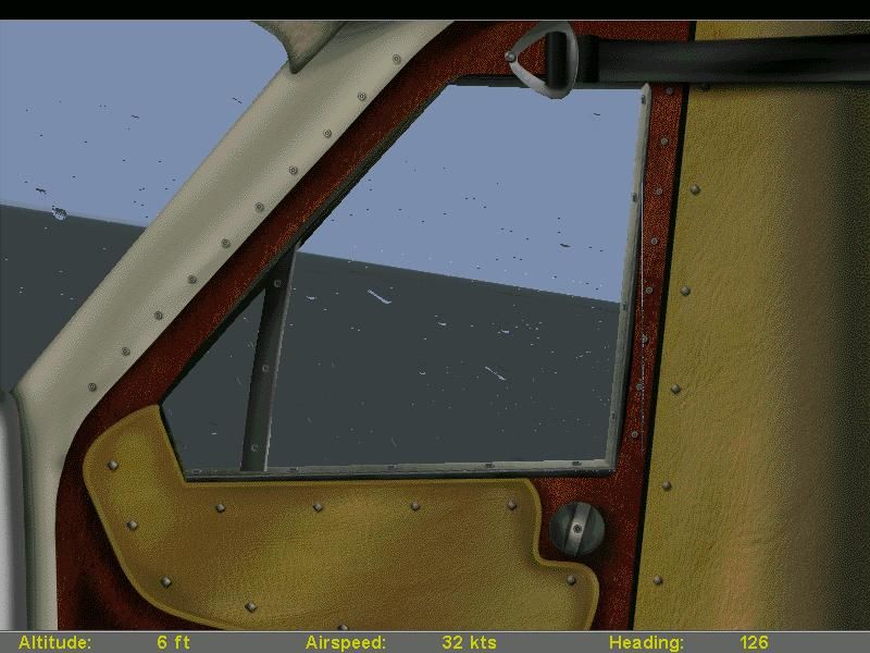 Flight Unlimited II (Windows) screenshot: Streaks of water slide back along the glass window