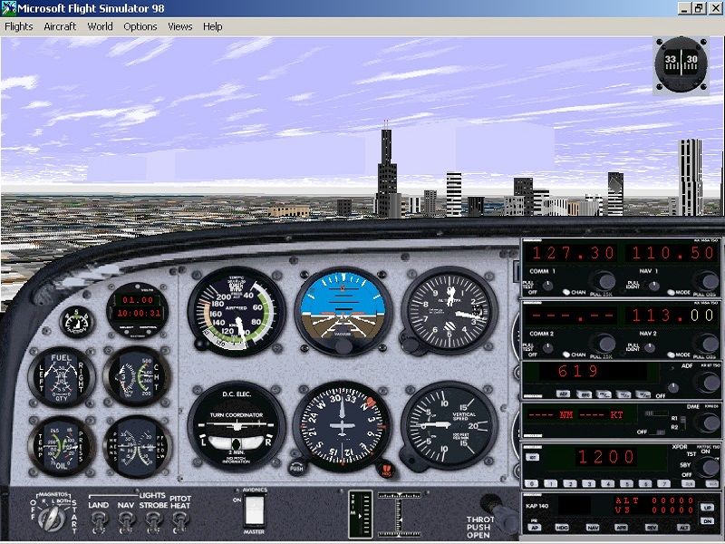 Microsoft Flight Simulator 98 (Windows) screenshot: Flying through Chicago, with the Sears Tower in the distance.