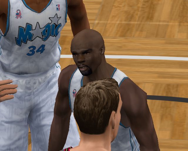 NBA 2K3 (PlayStation 2) screenshot: Believe it or not this is the guy's happy face - he's just scored