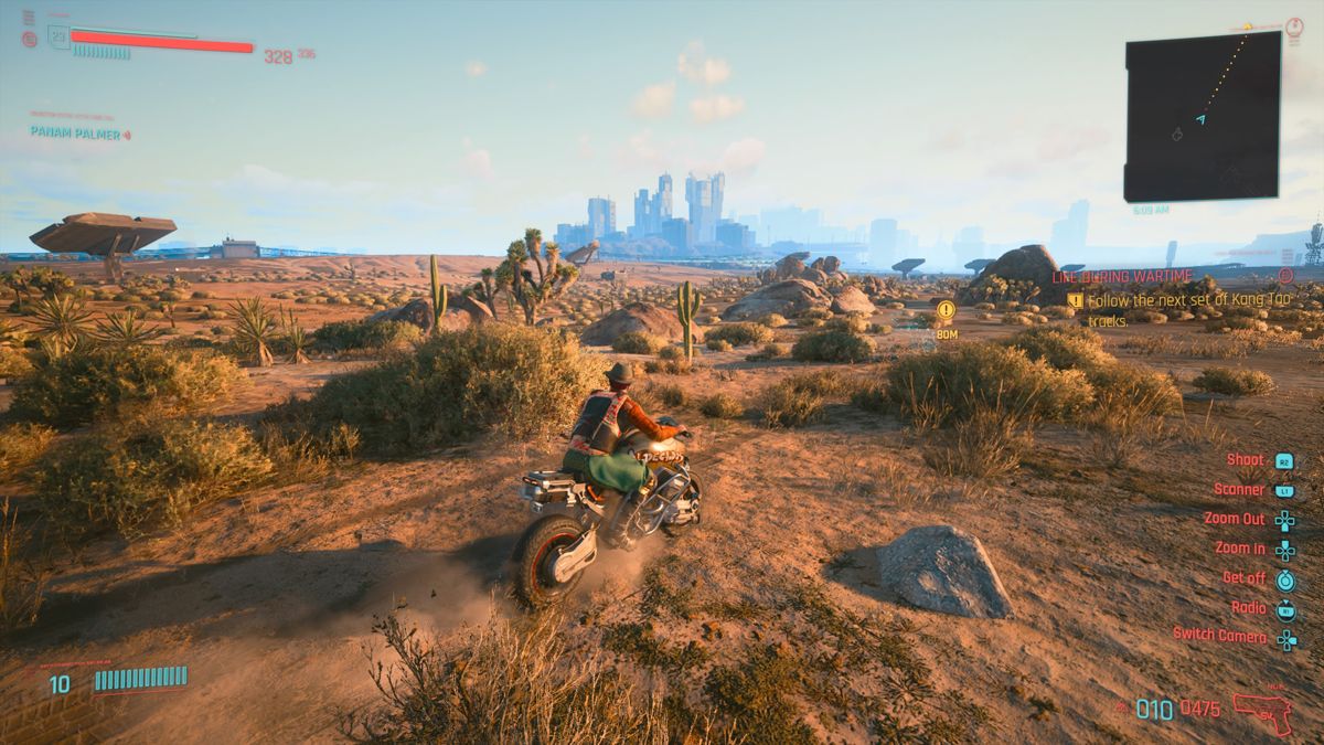 Cyberpunk 2077 (PlayStation 4) screenshot: Riding a bike through the desert