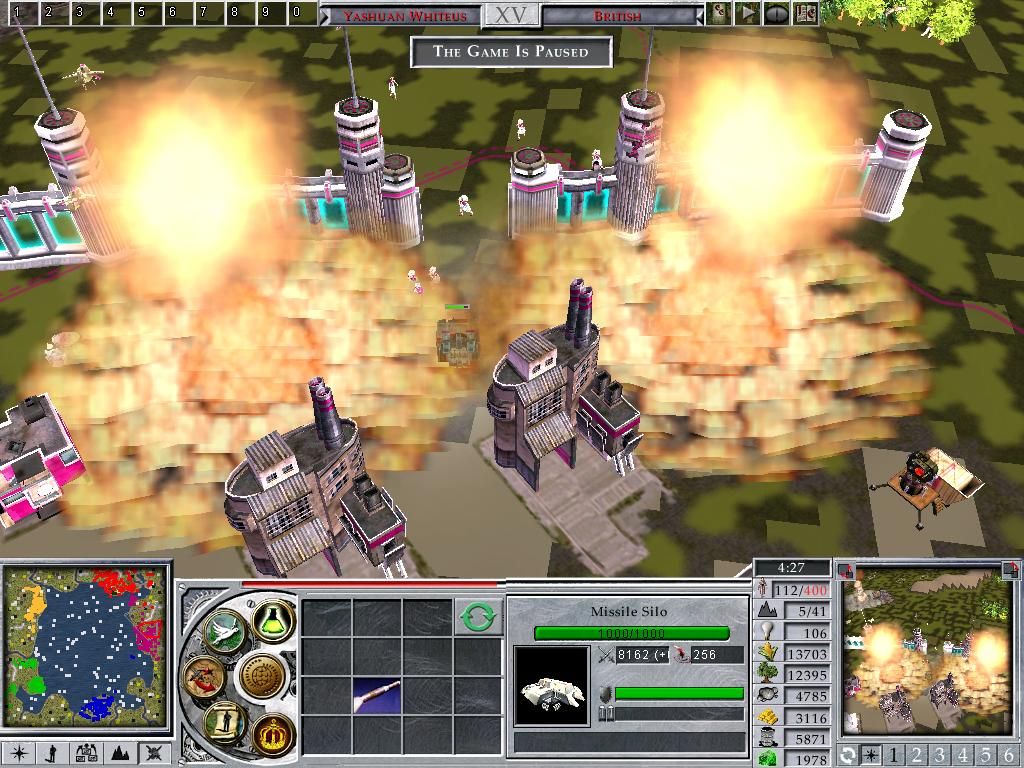 Empire Earth II (Windows) screenshot: Continuing with the fervor of showing him that I am boss, 2 more missiles destroy some factories.