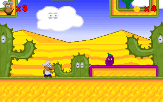 Super Roco Bros. (DOS) screenshot: Another enemy: an angry... plum? aubergine?