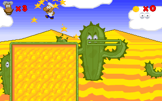 Super Roco Bros. (DOS) screenshot: Defeated enemies fall apart in a shower of coins - similar to <i>The Castle of Dr. Malvado</i>.
