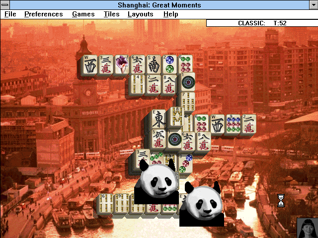 Shanghai: Great Moments (Windows 3.x) screenshot: The animations are dependent on the tile set used. With the mahjong tile set, Chinese themed animations play, like these pandas.