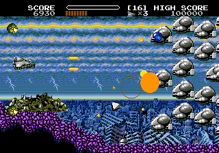 Bio-Ship Paladin (Genesis) screenshot: The bonus weapon is helping out in hitting the enemies