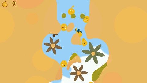 LocoRoco 2 (PSP) screenshot: LocoRocos can be split into small ones to pass in narrow passages