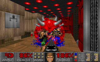The Ultimate Doom (DOS) screenshot: I lose my apetite, he loses his intestines.