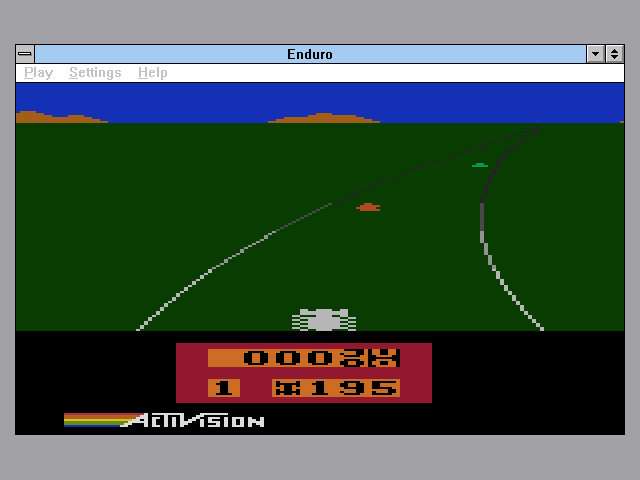 Activision's Atari 2600 Action Pack 2 (Windows 3.x) screenshot: Enduro was a ground breaking racing game for the system, featuring a day to night cycle and challenges such as icy roads.