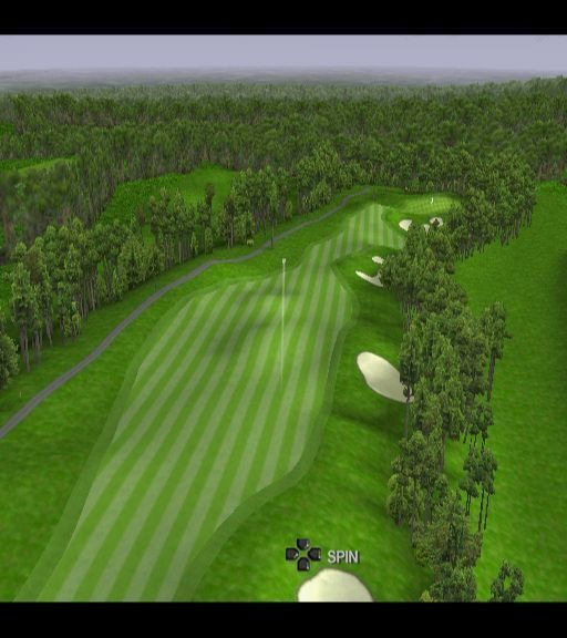 Tiger Woods PGA Tour 2001 (PlayStation 2) screenshot: When the ball has been struck some distance it leaves a comet-like trail which makes it easier to spot in these aerial views