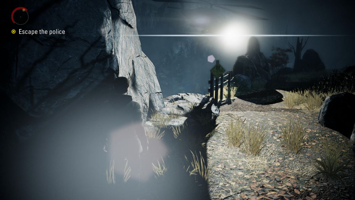 Alan Wake: Remastered (PlayStation 5) screenshot: Alan Wake: Hiding from the helicopter