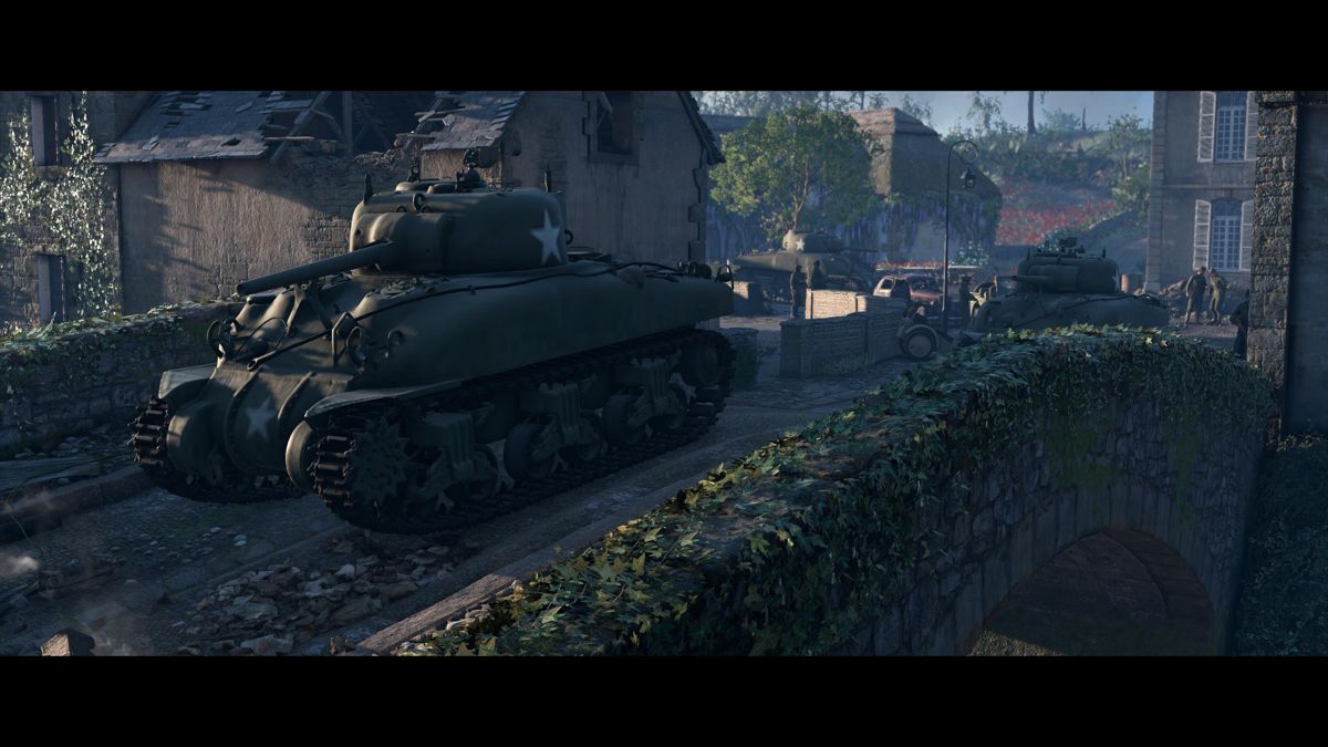 Sniper Elite 5: France (PlayStation 5) screenshot: Allied Sherman tanks arrive once I've dealt with every enemy around, including all of Tiger II tanks