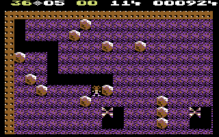 Boulder Dash (Commodore 64) screenshot: When smashed with a boulder, the butterflies turn into diamonds