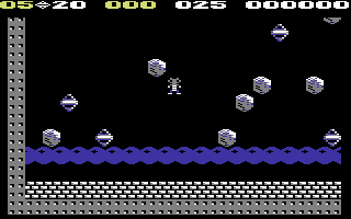 Boulder Dash II: Rockford's Revenge (Commodore 64) screenshot: Yikes, boulders and diamonds falling from the sky!!