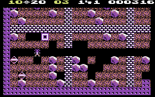 Boulder Dash (Commodore 64) screenshot: Those square things are dangerous...