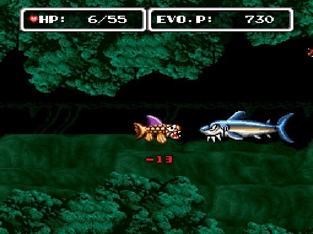 E.V.O.: Search for Eden (SNES) screenshot: First Boss, biting a chunk out of my fish.