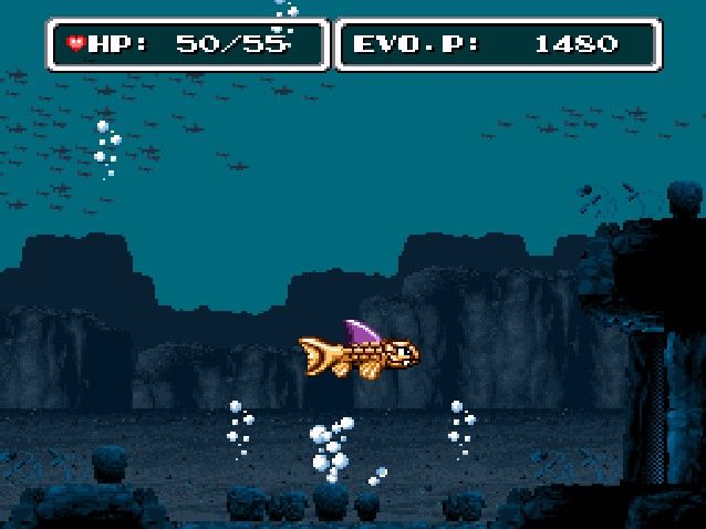 E.V.O.: Search for Eden (SNES) screenshot: End of first area, bubbles appear and evolution continues...
