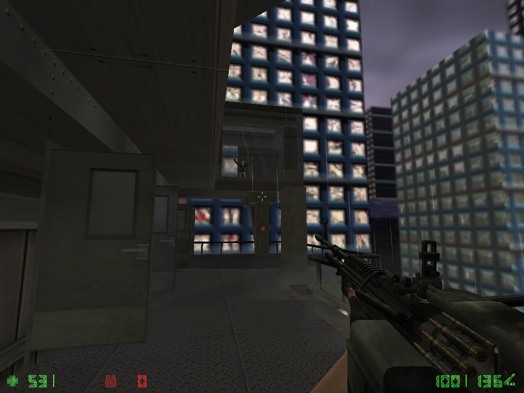 Counter-Strike: Condition Zero (Windows) screenshot: At the top of a skyscrapper trying to take down a nuke-wielding madman