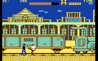Express Raider (Commodore 64) screenshot: Fighting before boarding the train