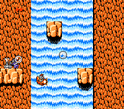Disney's TaleSpin (NES) screenshot: Flying down the waterfall