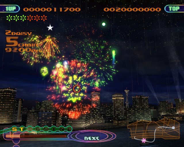 FantaVision (PlayStation 2) screenshot: A daisy chain is a chain with two or more fireworks of one colour, a wild firework, two or more of another colour etc. They are hard to construct and score more bonus points