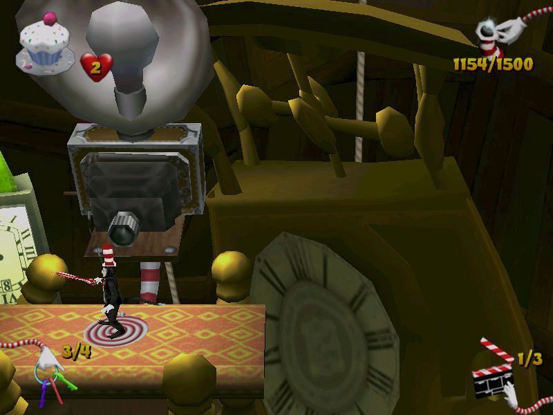 Dr. Seuss' The Cat in the Hat (Windows) screenshot: Swirly patterns on the ground near cameras are checkpoints. Three of the four keys have been collected as have most of the pieces of magic