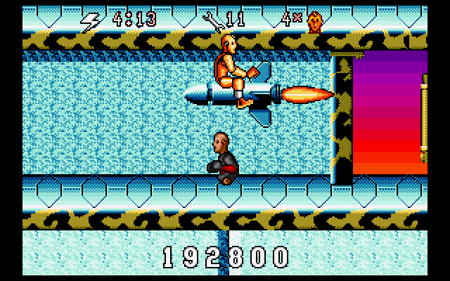 The Incredible Crash Dummies (Amiga) screenshot: "Hey, dude, you're not suppose to ride that missile. Didn't you read the sign back there?"