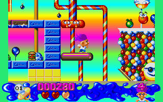 Trolls (DOS) screenshot: Hopping on platforms in the candy world (MCGA/VGA)
