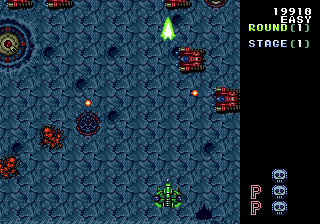 Truxton (Genesis) screenshot: This green weapon seems to be better...