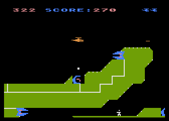 Chopper Rescue (Atari 8-bit) screenshot: Throwing the bomb