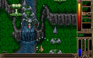 Tyrian (DOS) screenshot: Huge enemies on a waterfall