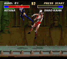 Ultimate Mortal Kombat 3 (SNES) screenshot: Kitana applies a super kick in this skull-masked-tough-man... Wait! I've seen this face before!