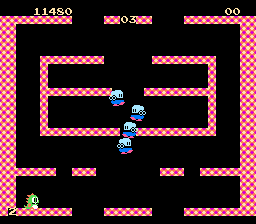 Bubble Bobble (NES) screenshot: The baddies are coming...