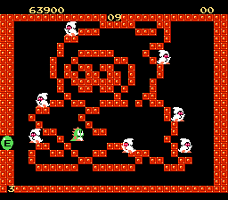 Bubble Bobble (NES) screenshot: A more difficult level. Less place to make bubbles, and those white suckers are tougher