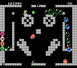 Bubble Bobble (NES) screenshot: Now all the angry fish are gone, a super-angry fish appears