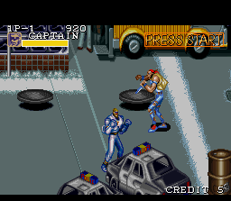 Captain Commando (SNES) screenshot: Wouldn't you just love to grab a police car and start throwing it at someone?
