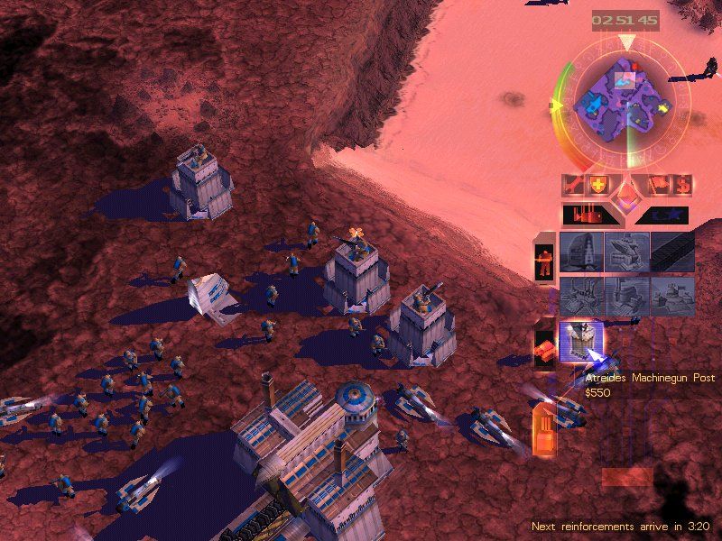 Emperor: Battle for Dune (Windows) screenshot: One thing you'll never lack for sure... the spice. Machine gun turrets are rather efficient against enemy infantry, just as always.