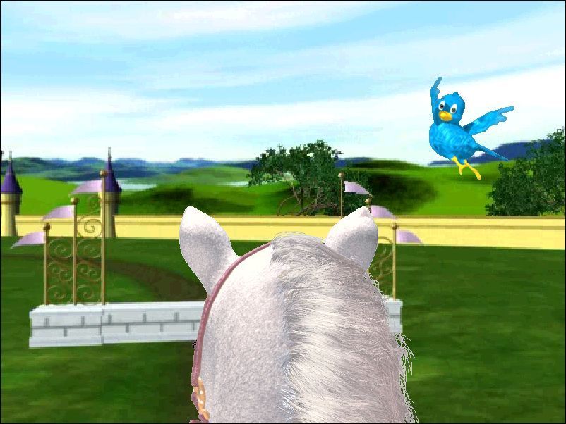 Disney Princess: Royal Horse Show (Windows) screenshot: The Royal Showground This is the player's view as they approach a jump. The bird is one of Snow White's forest friends who appears when its time to jump