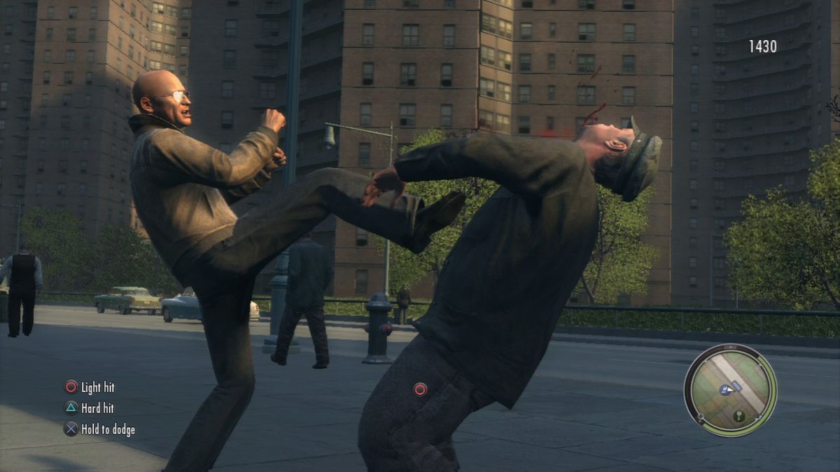 Mafia II: The Betrayal of Jimmy (PlayStation 3) screenshot: Finishing kick in the teeth